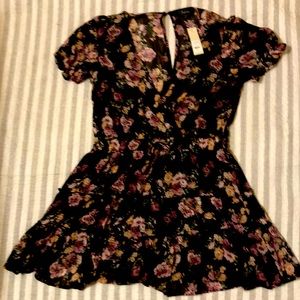 Francesca’s short black dress with purple flowers
